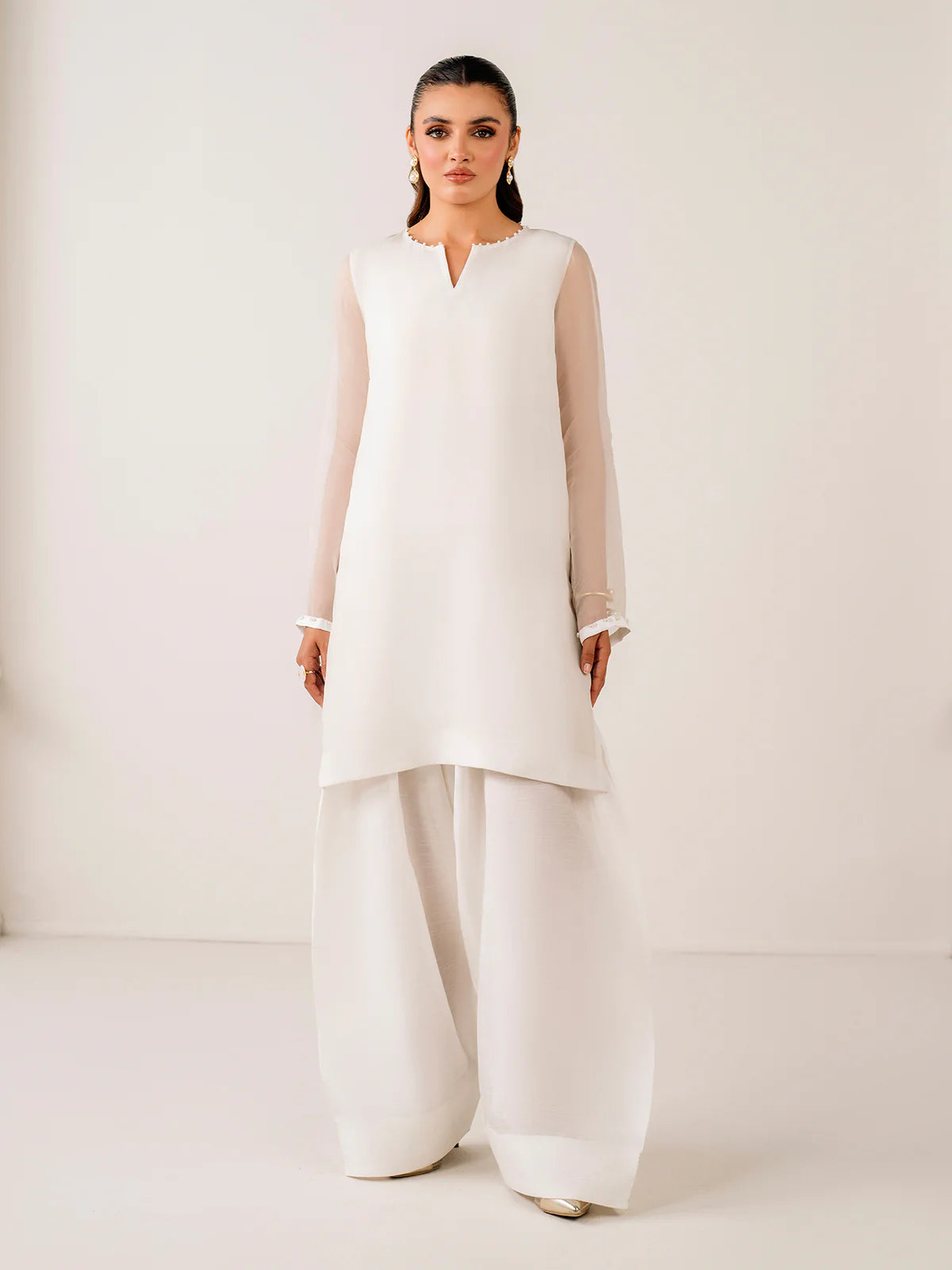 Structured farshi shalwar paired with airy chiffon top
