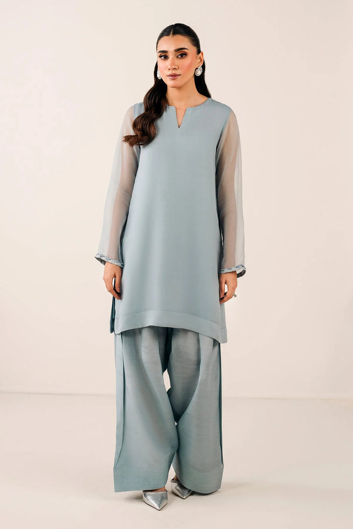 Short chiffon shirt with bead accents and slit neckline
