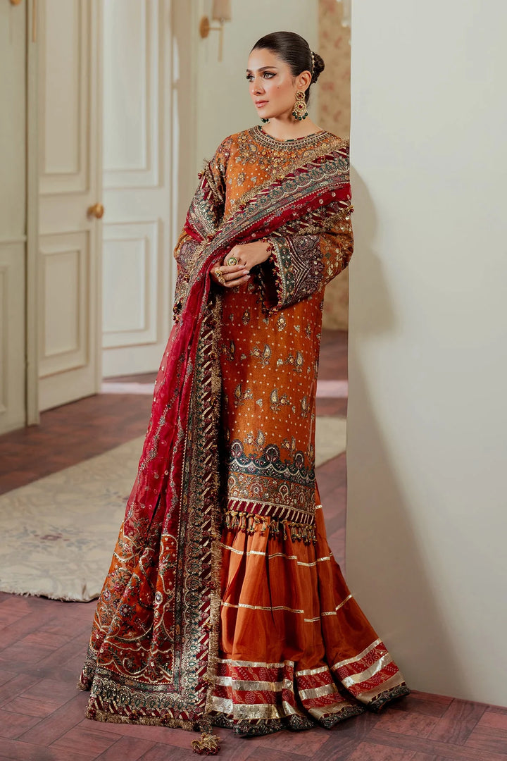 side angle of Hand-embroidered Pakistani suit in zari net with velvet and silk detailing