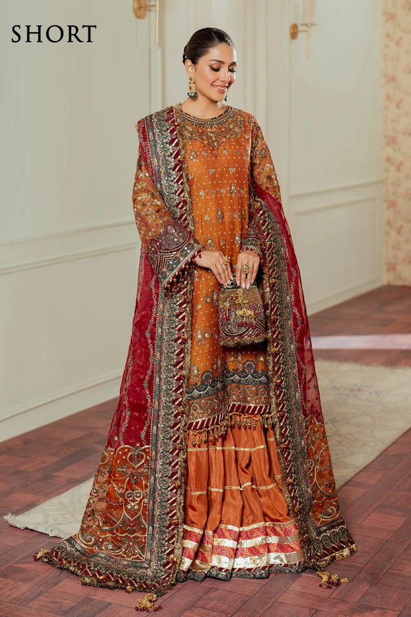 Hand-embroidered Pakistani suit in zari net with velvet and silk detailing