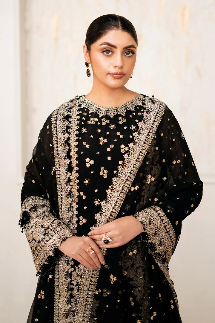 Close up of Baroque stitched black chiffon embroidery and gold hand embellishment – Naaz by Nazia