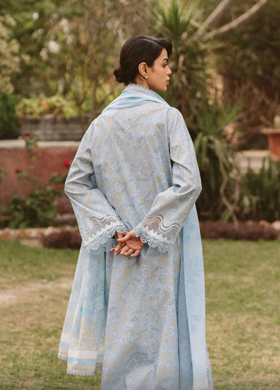 Back view showing chiffon dupatta drape and shirt embroidery