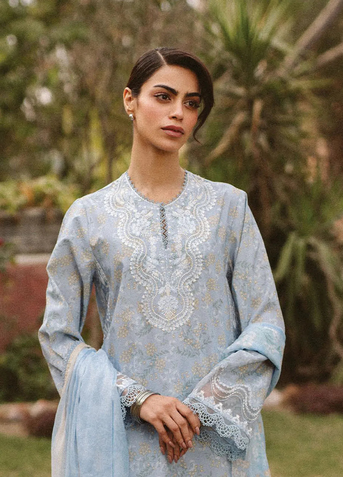 Close-up of neckline and intricate embroidery on lawn shirt