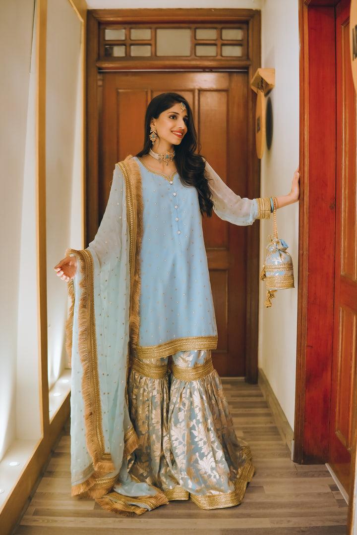 8-piece bridal wedding collection with gharara, potli bag, khussa shoes, and jewelry – perfect for nikaah or wedding functions.