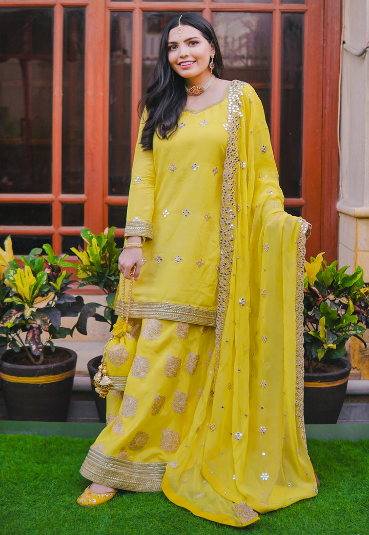Complete Pakistani wedding trousseau featuring gharara, dupatta, potli clutch, khussa shoes, and jewelry for nikaah events.