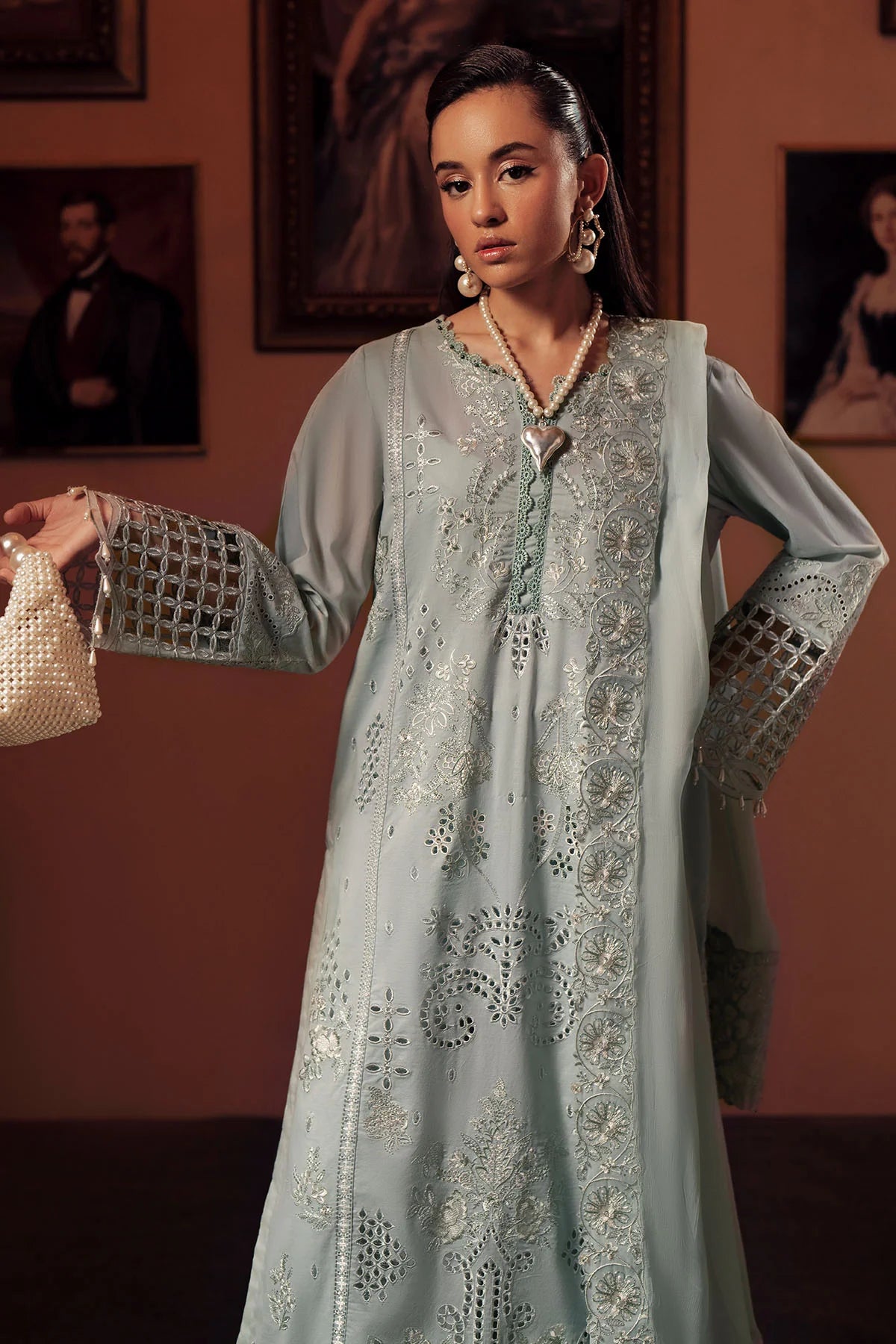 Side profile of FEYA FE-11 showcasing chiffon dupatta drape and intricate embroidery
