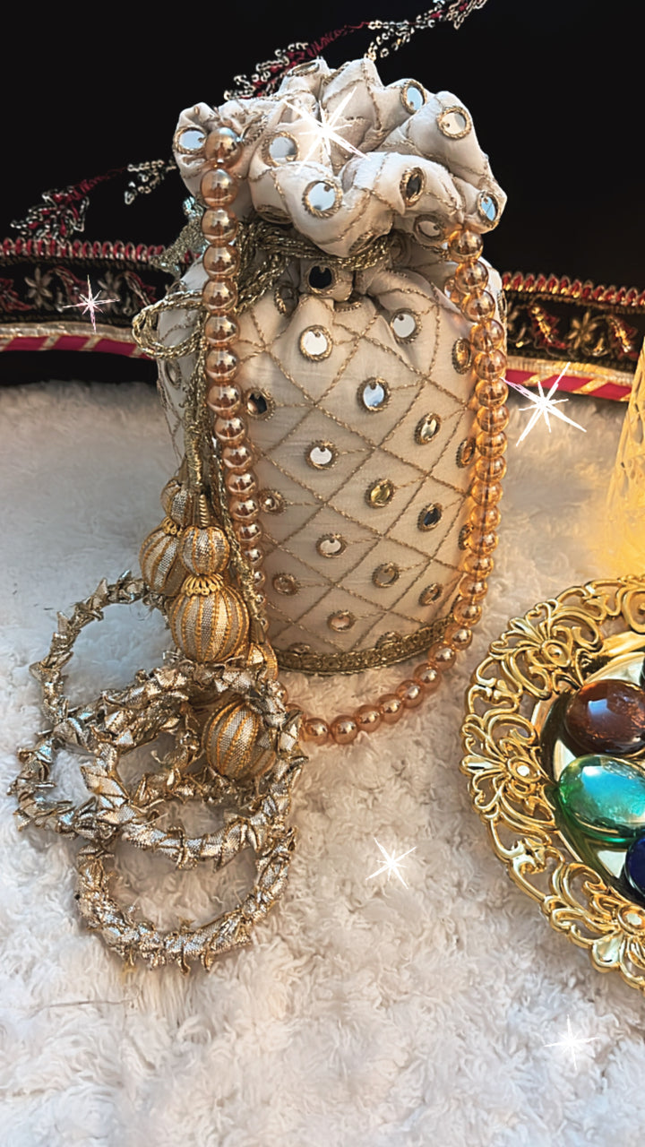 Designer 8-piece bridal set with gharara, potli bag, khussa footwear, and statement jewelry for mehndi or festive functions.