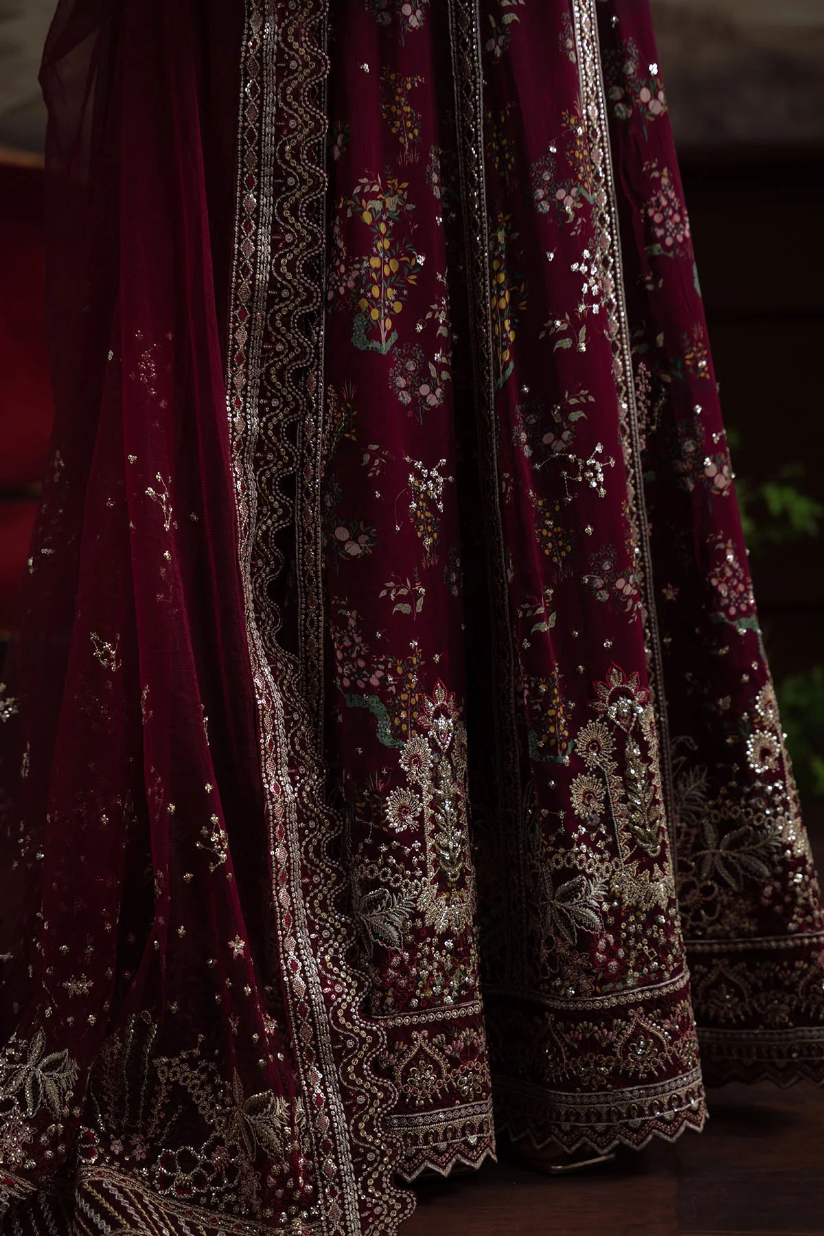 Elegant bridal look in NEL-72 by Nureh featuring floral network and stitched silhouette
