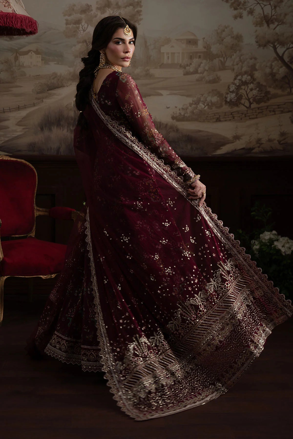 Full-length back view of stitched Elanora NEL-72 suit in rich maroon with gold accents

