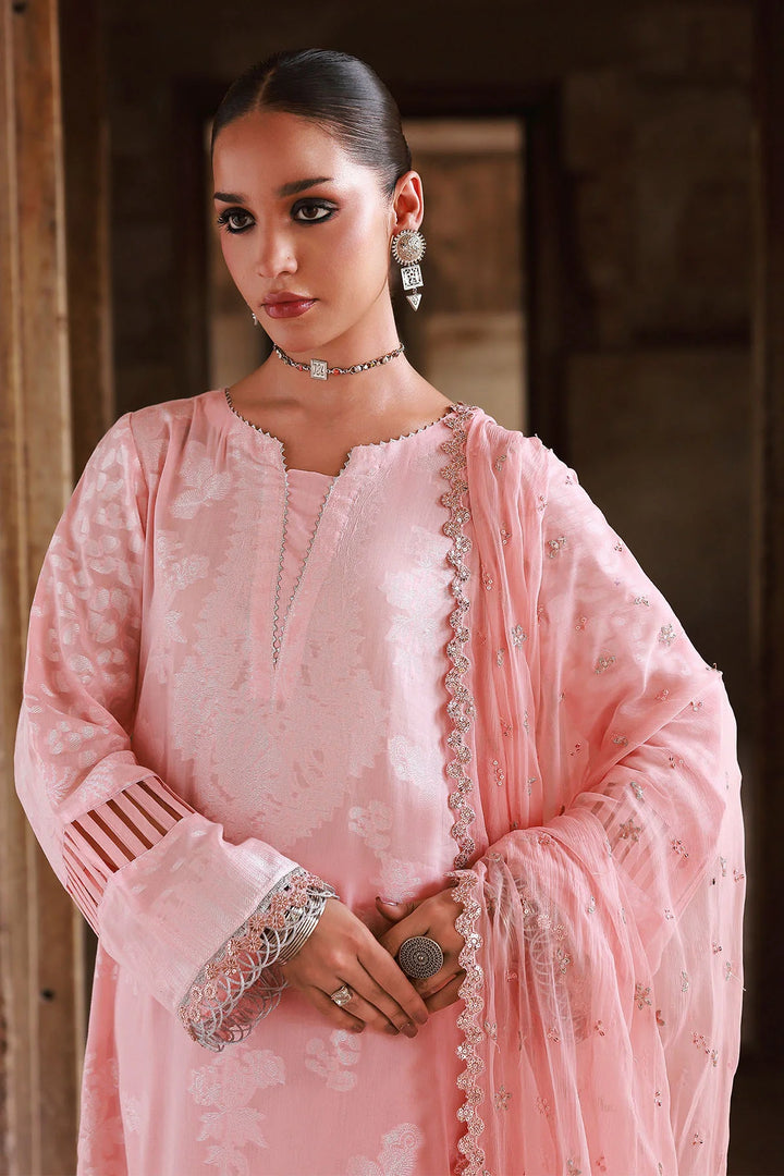 Nureh designer suit with chiffon dupatta and dyed cotton trousers
