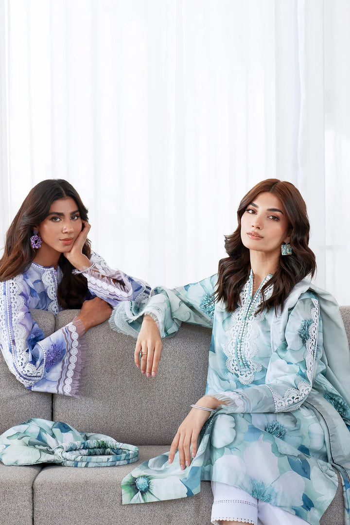 sit down view of embroidered digital print suit with matching dupatta and trouser