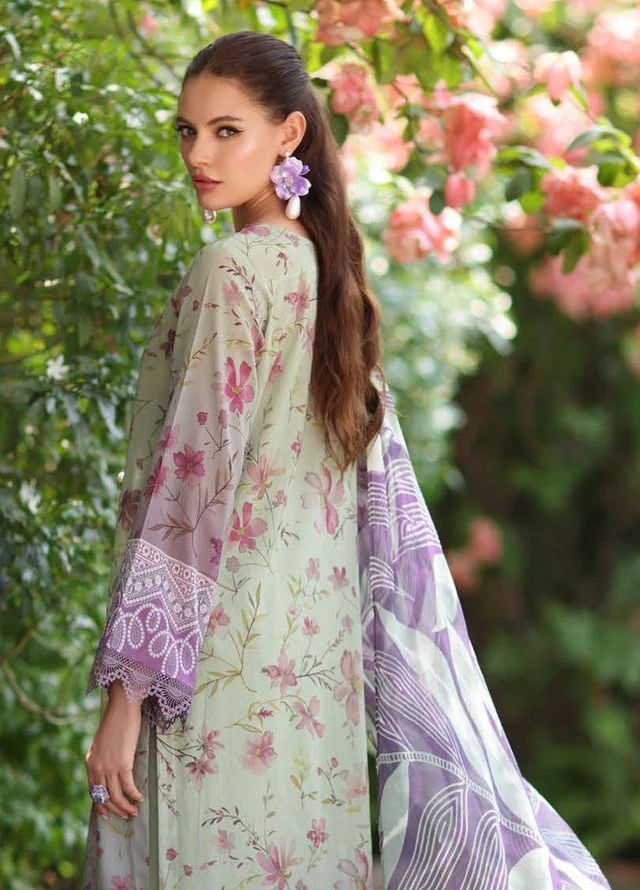 Side pose showcasing Swiss lawn shirt and dupatta flow