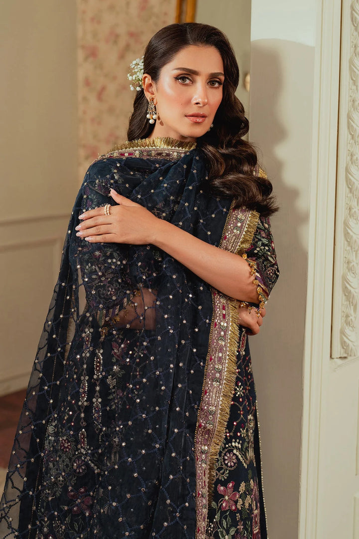 dupatta close up stitched raw silk Pakistani formal outfit with embroidered dupatta and shalwar
