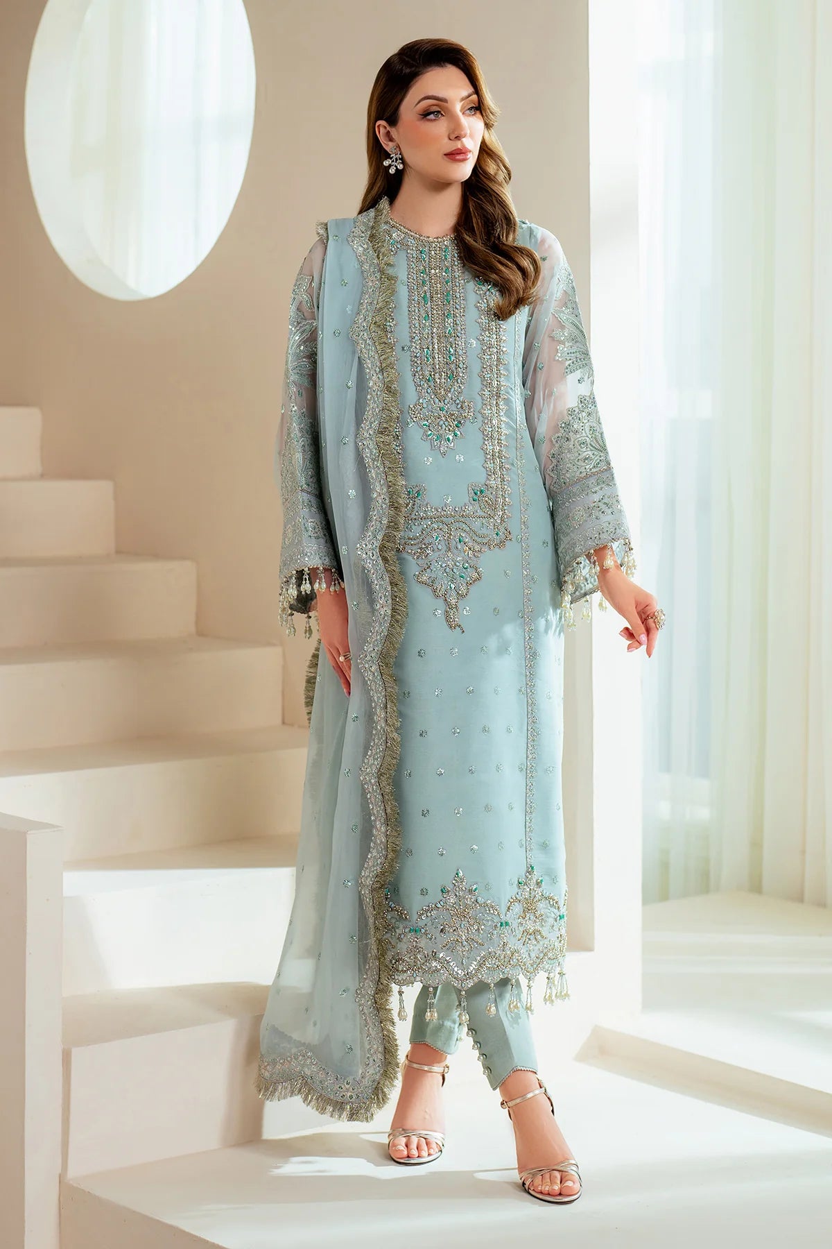 Model wearing Orla ice blue bamber chiffon outfit with hand embroidery and chiffon dupatta