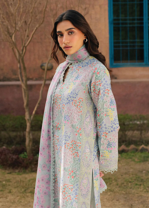 Flat lay of 3-piece embroidered lawn suit with dupatta and trouser