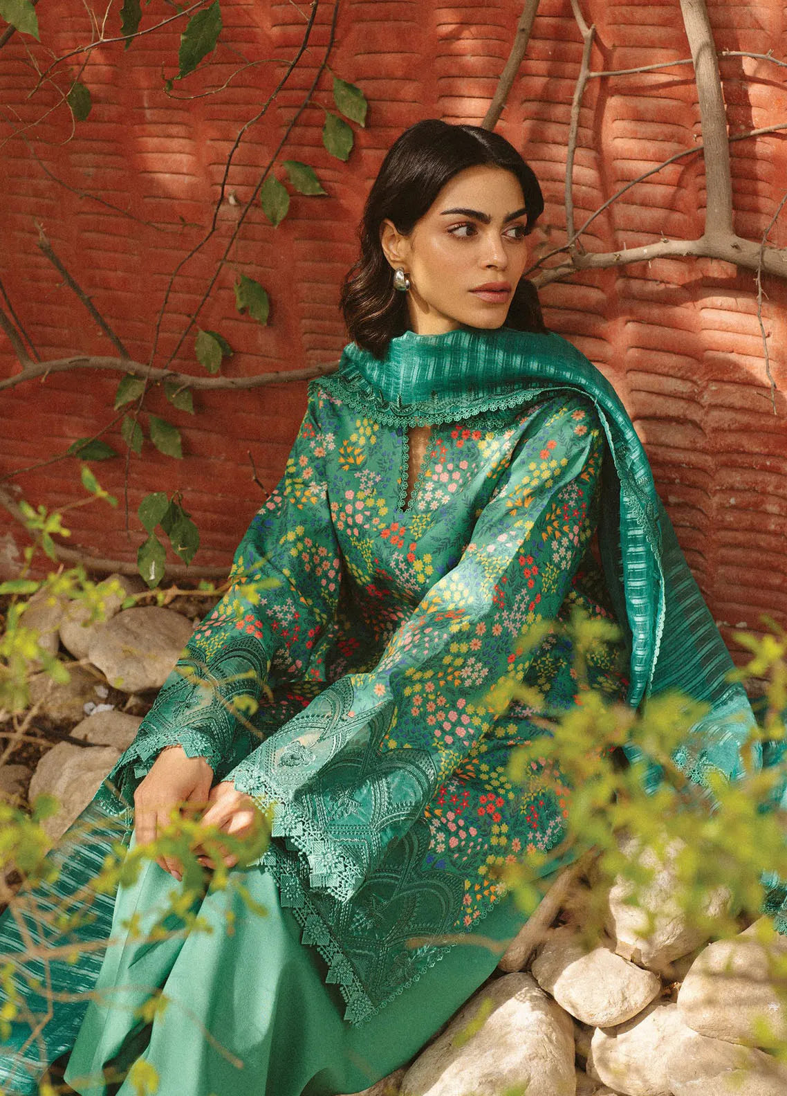 Model sitting in Ayzel embroidered outfit, styled for Eid or summer events