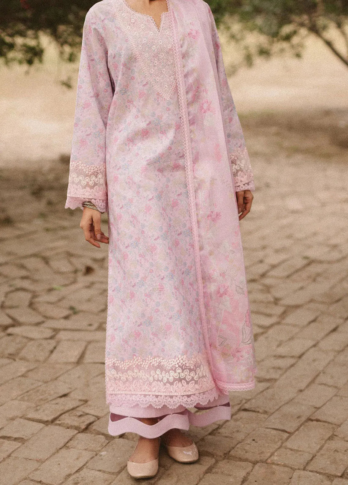 Zoomed-in image of organza border and stitched trouser hem