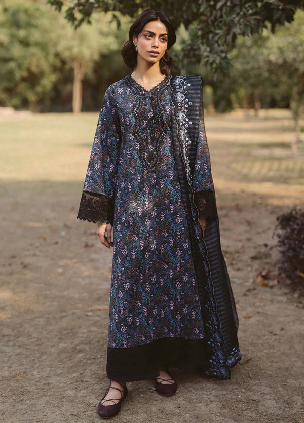 Flat lay of 3-piece embroidered lawn suit with dupatta and trouser