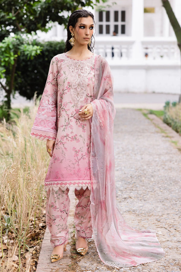 Model wearing Nureh 3-piece lawn suit with printed chiffon dupatta and Chikankari neckline