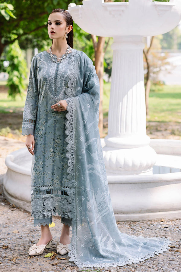 Model wearing Nureh 3-piece lawn suit with printed chiffon dupatta and Chikankari neckline