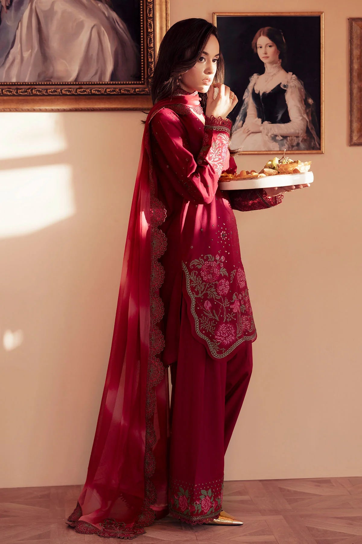 Model wearing FEYA 3-piece stitched lawn suit for Eid or festive wear
