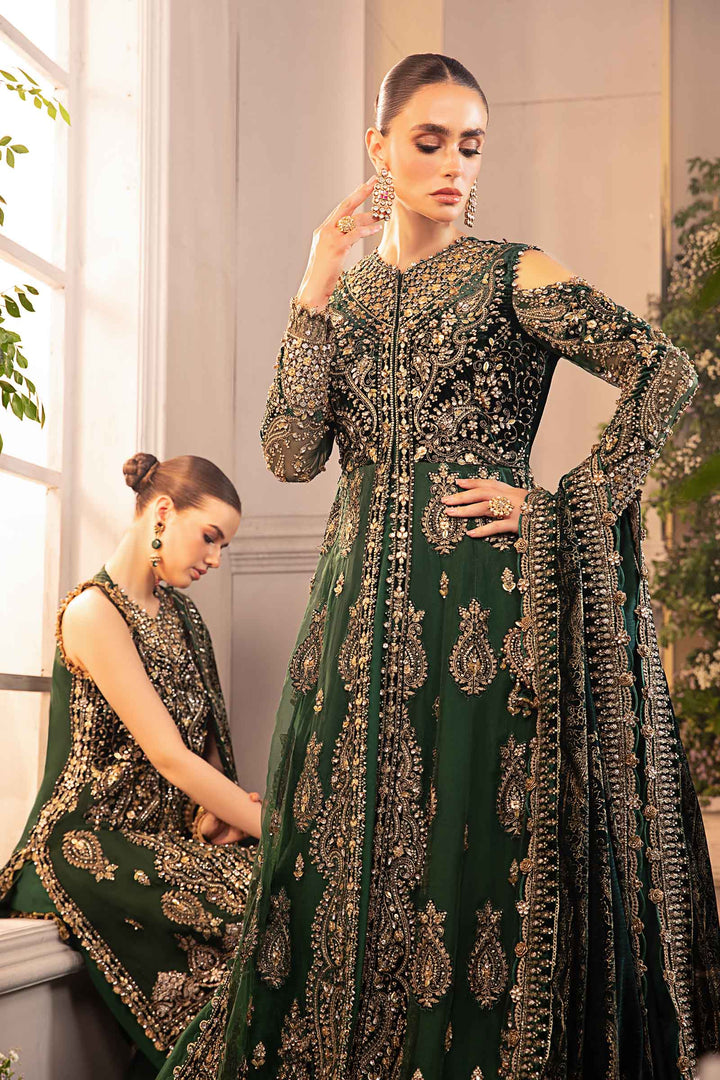 close up Maria B emerald green embroidered formal suit with velvet and organza detailing
