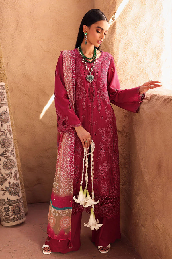 Model wearing Nureh Bazaar Collection stitched Doriya lawn suit with Mukeshkari dupatta