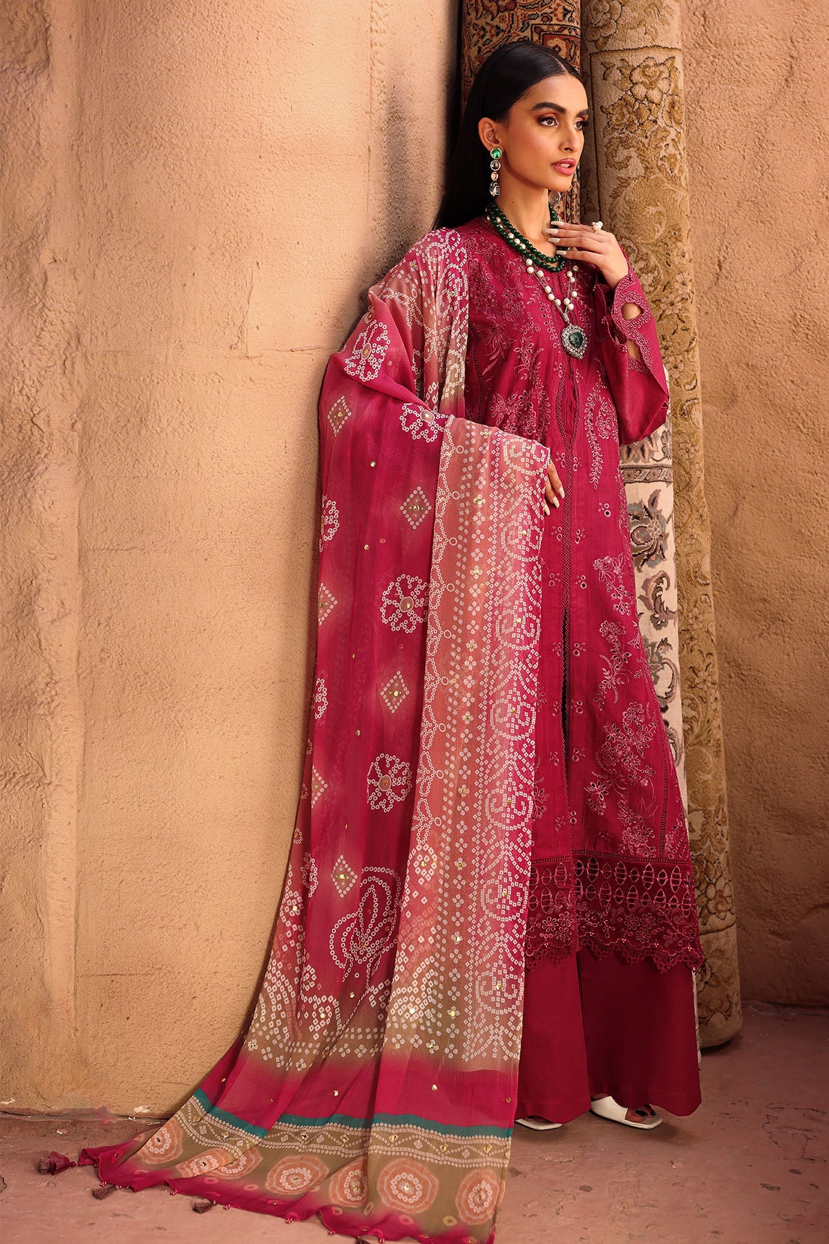 Flat lay of Nureh 3-piece stitched lawn outfit with dupatta