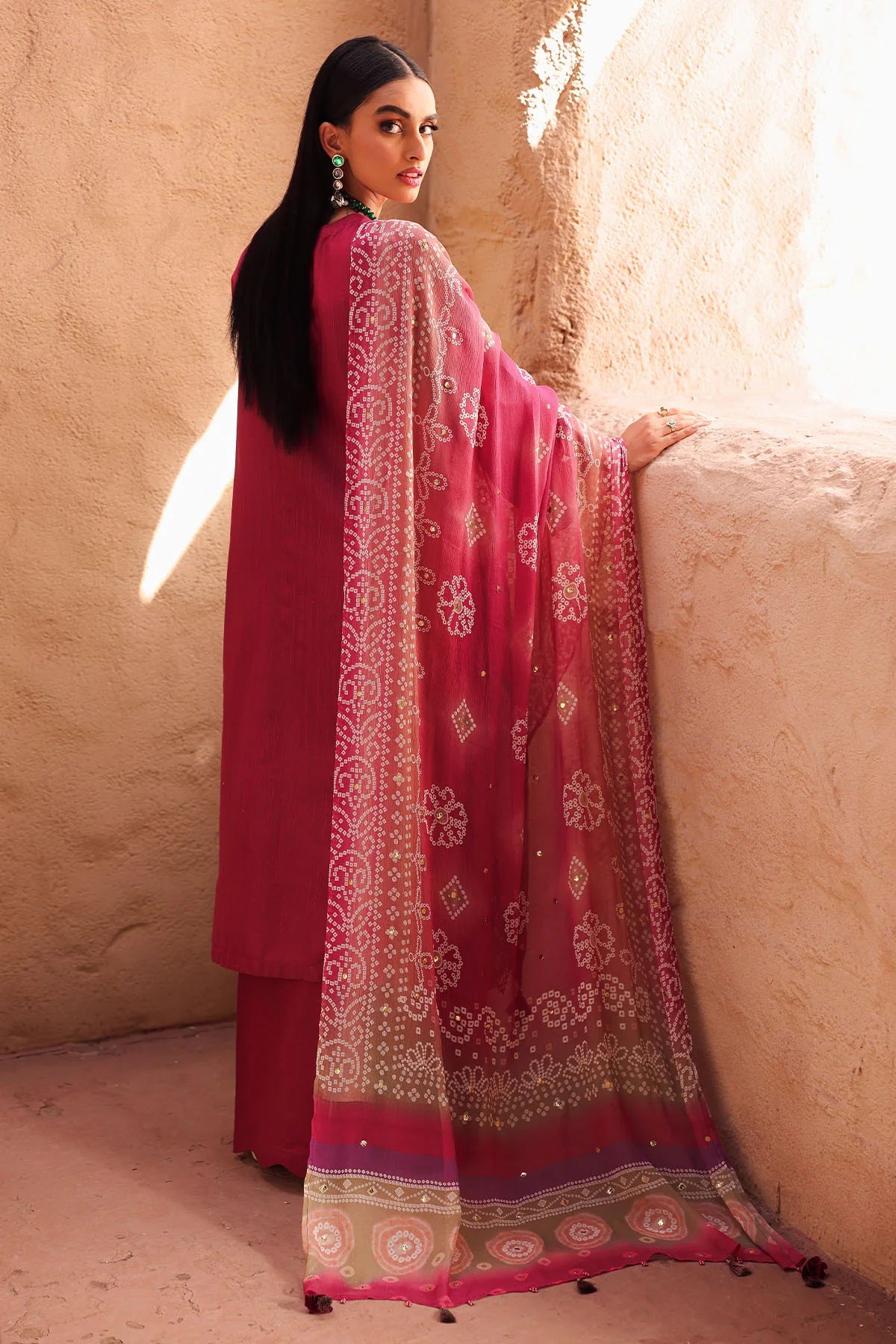 Side view of model showing dupatta drape and trouser fit
