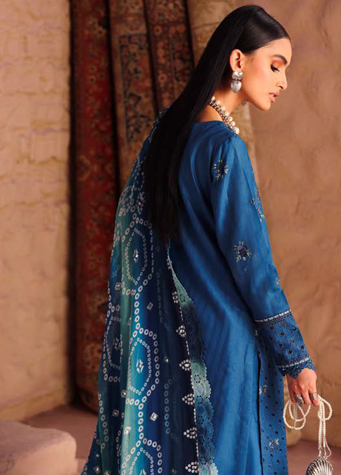 Side view of model showing dupatta drape and trouser fit