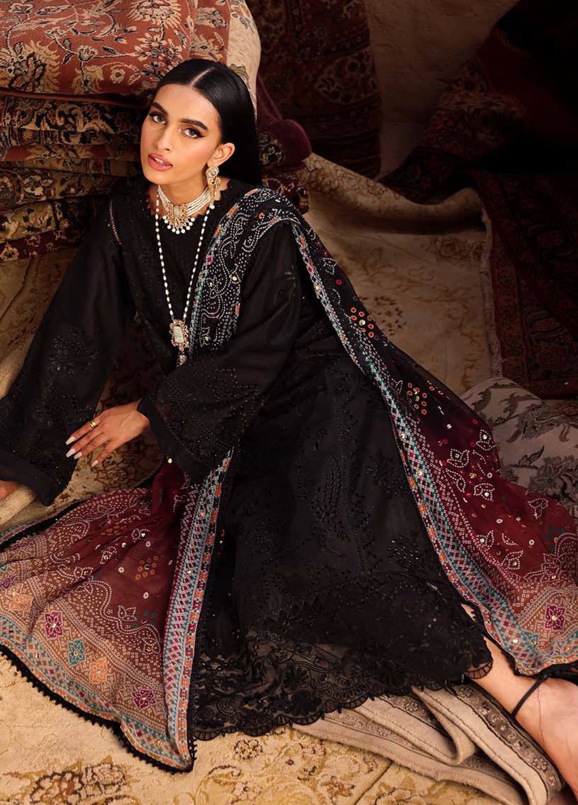 Model styled for formal event in Nureh embroidered lawn dress