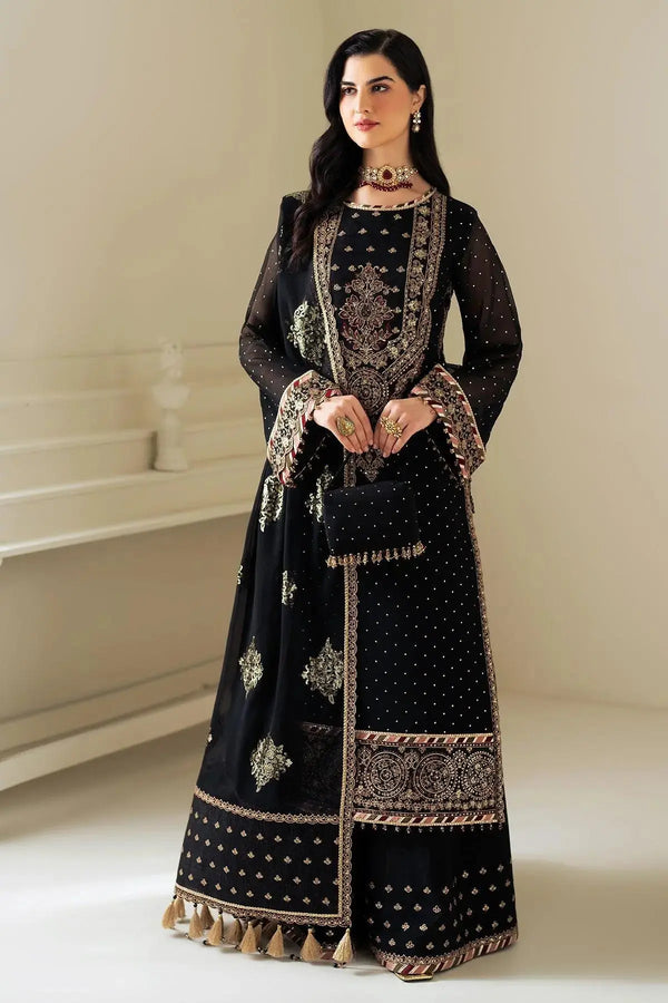Model wearing Alizeh Alba black chiffon suit with pearl embellishments and embroidered dupatta