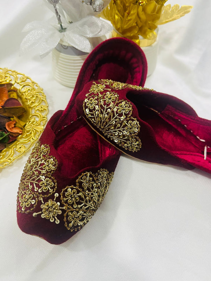 Red velvet embroidered khussas for women with golden threadwork – handcrafted traditional flats by Naaz by Nazia